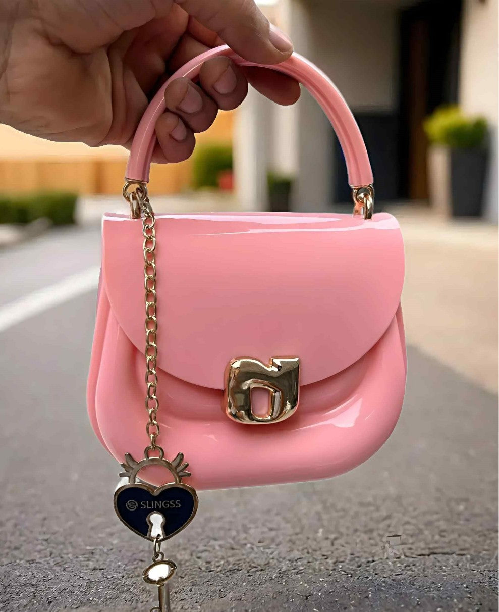 Slingss Mini Partywear Pink Silicon Purse For Girls With Handel & Long Belt