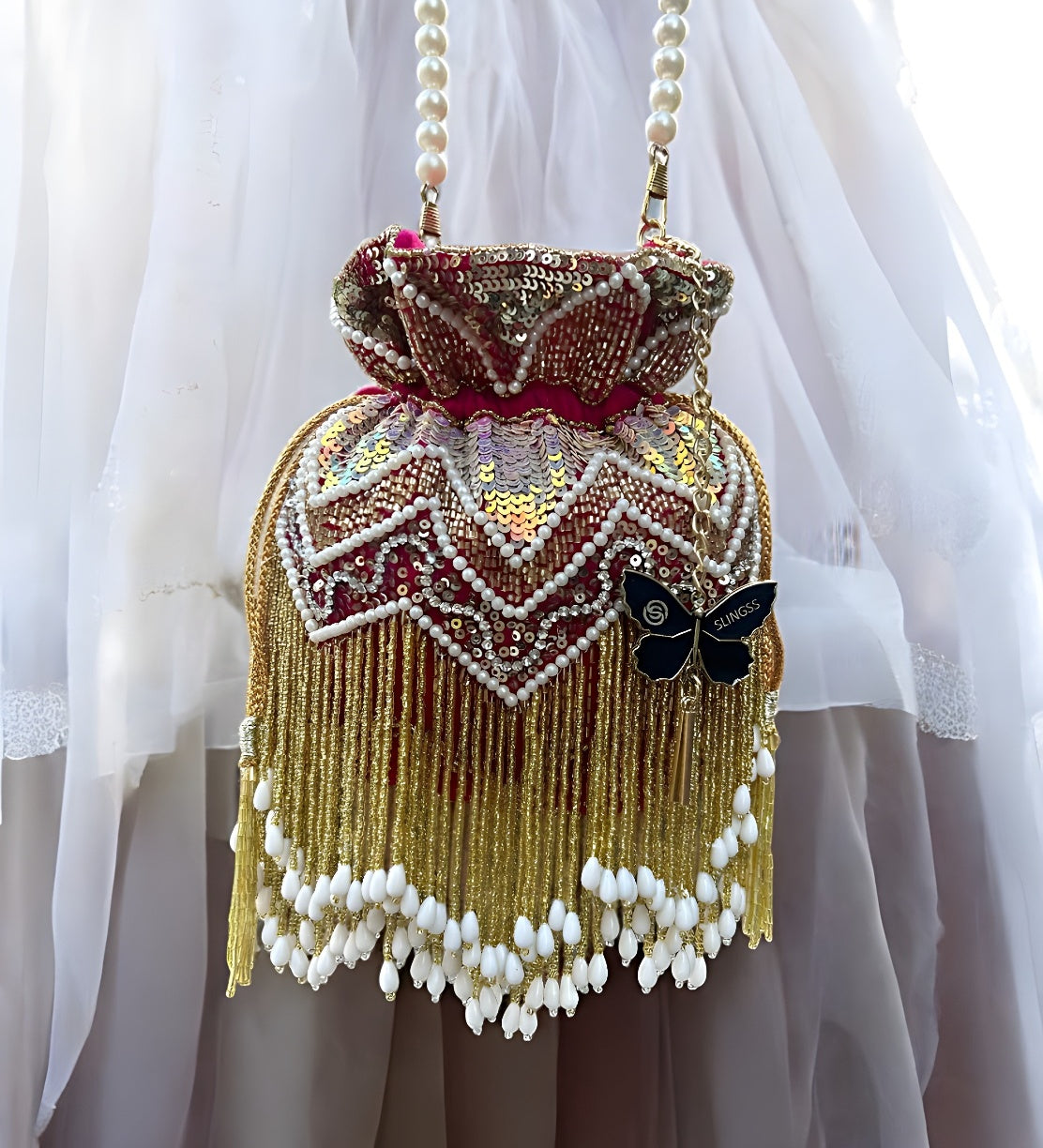 Slingss Premium Partywear Magenta Embroidered Potli For Ladies With White beads Handle