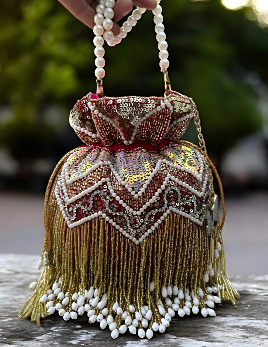 Slingss Premium Partywear Magenta Embroidered Potli For Ladies With White beads Handle