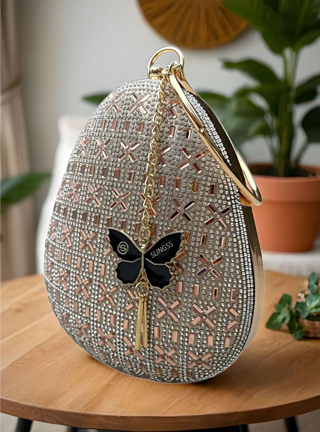 Slingss Exclusive Premium Oval Shape Partywear Embroidered Clutch For Ladies With Golden Handle & Chain