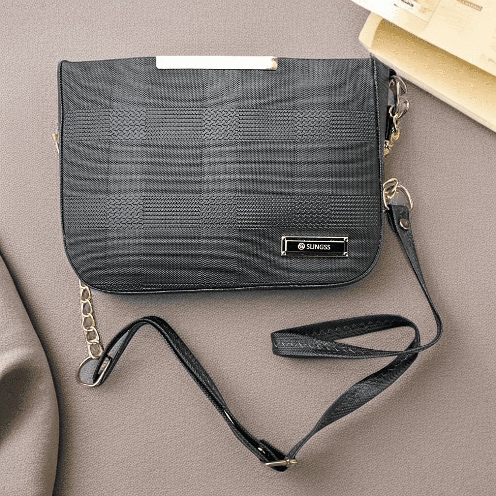 Slingss Solid Black Textured Sling Bag For Ladies With Long Belt