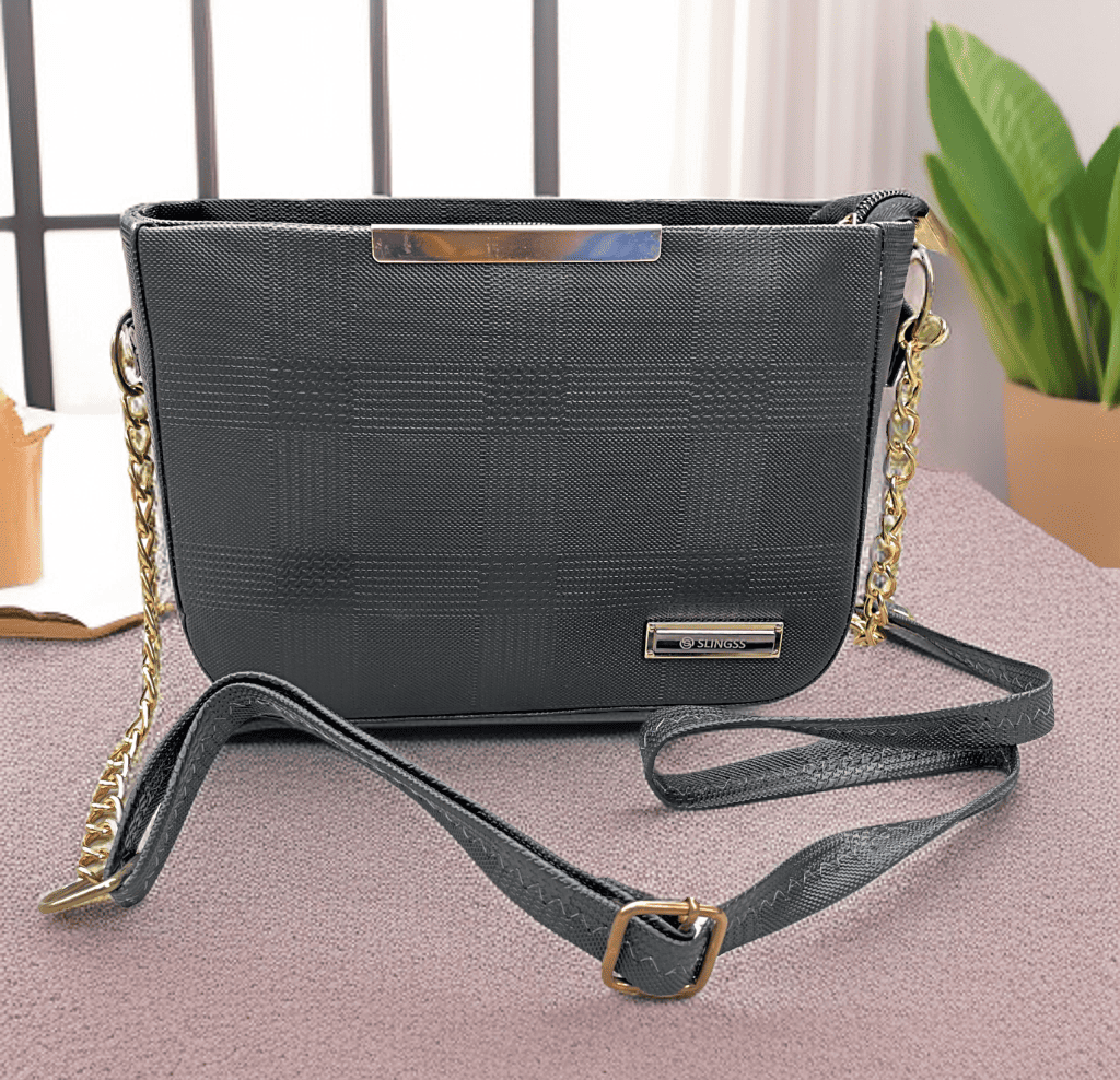 Slingss Solid Black Textured Sling Bag For Ladies With Long Belt