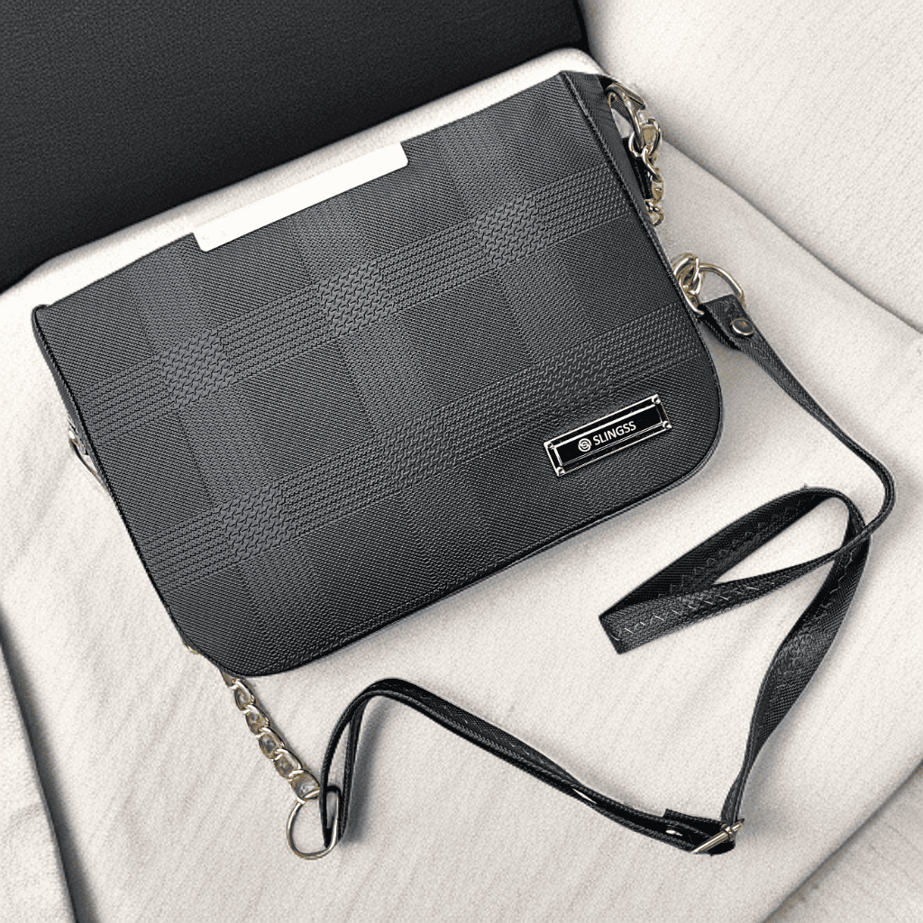 Slingss Solid Black Textured Sling Bag For Ladies With Long Belt