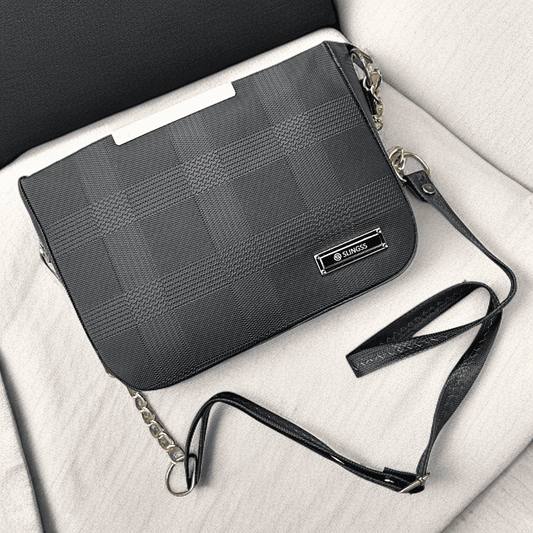 Slingss Solid Black Textured Sling Bag For Ladies With Long Belt
