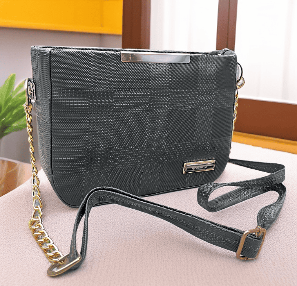 Slingss Solid Black Textured Sling Bag For Ladies With Long Belt