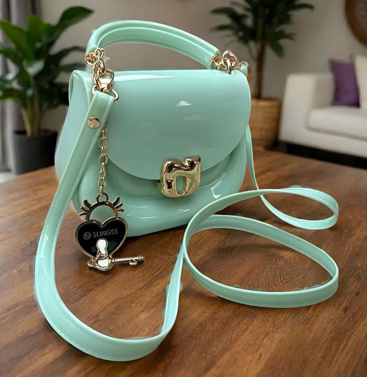 Slingss Mini Partywear Green Silicon Purse For Girls With Handel & Long Belt
