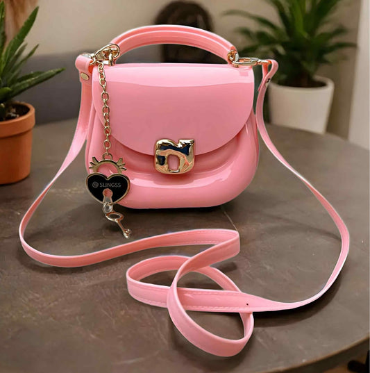 Slingss Mini Partywear Pink Silicon Purse For Girls With Handel & Long Belt