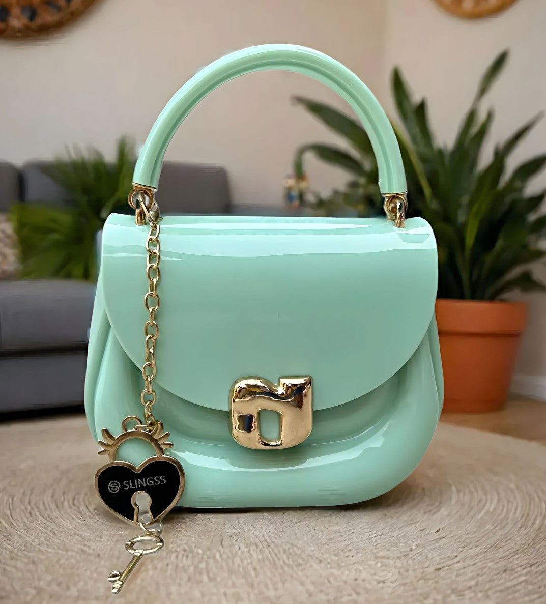 Slingss Mini Partywear Green Silicon Purse For Girls With Handel & Long Belt